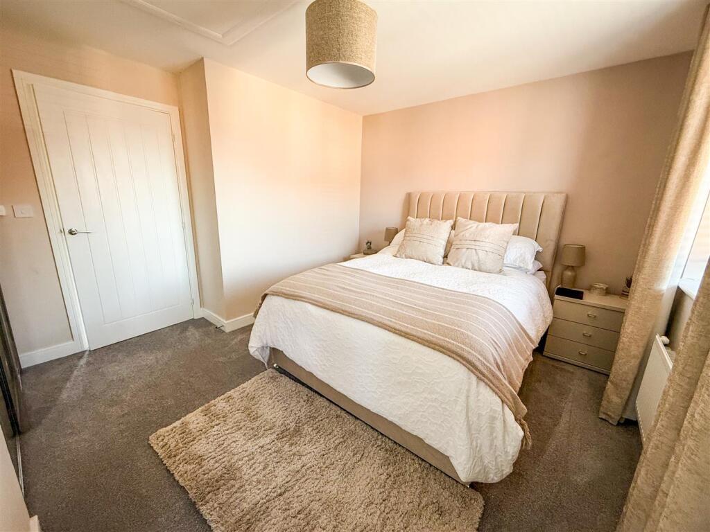 ALTERNATE VIEW OF BEDROOM ONE
