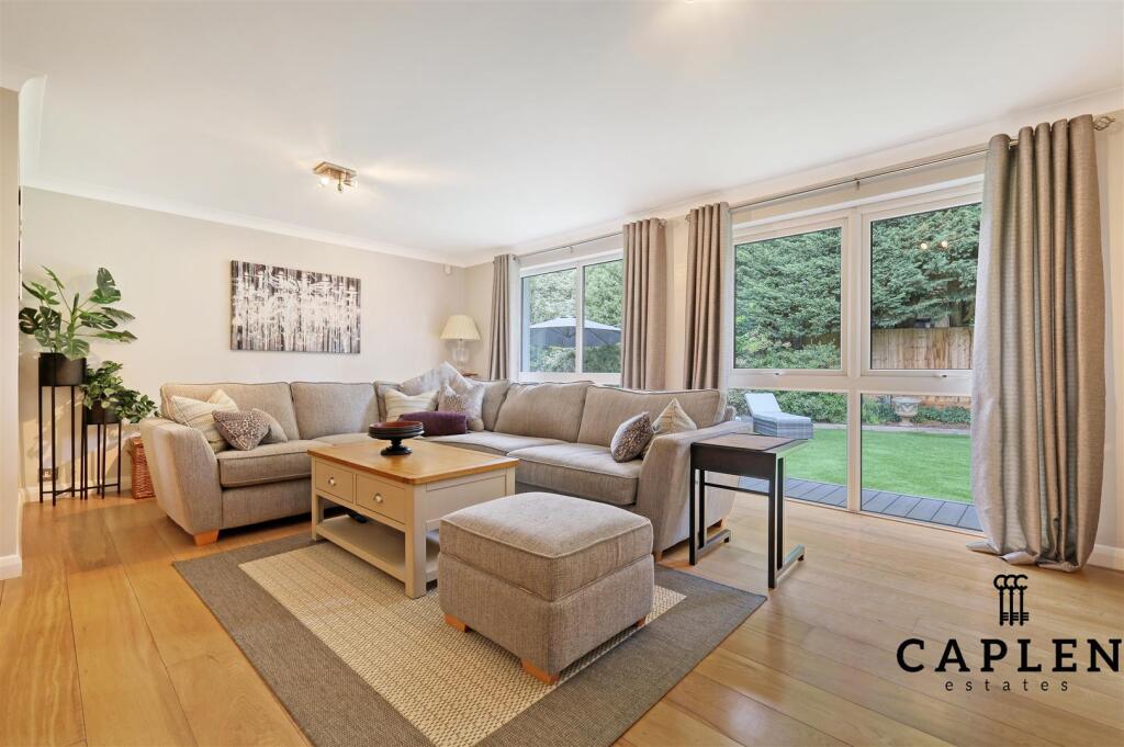 Living Room floor to ceiling windows.jpg