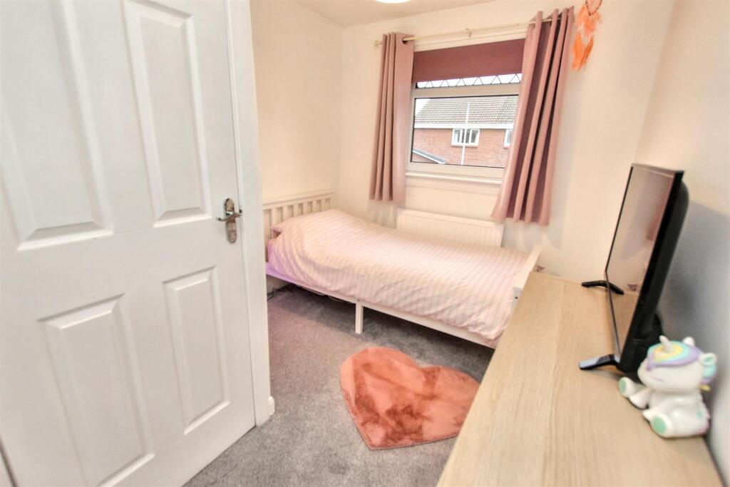 16- Bedroom Three.jpg