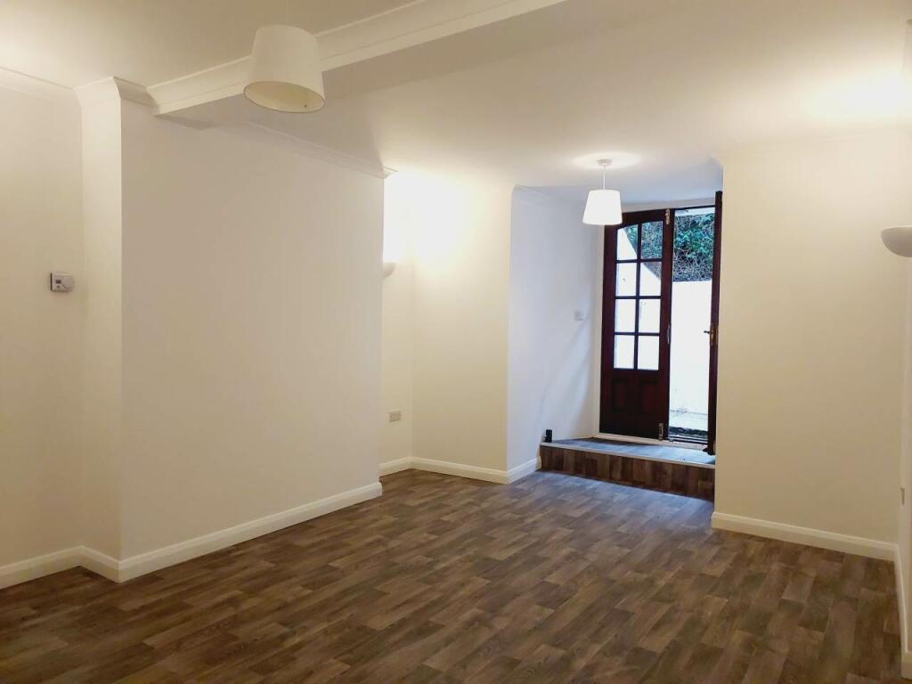 Room with doors to g