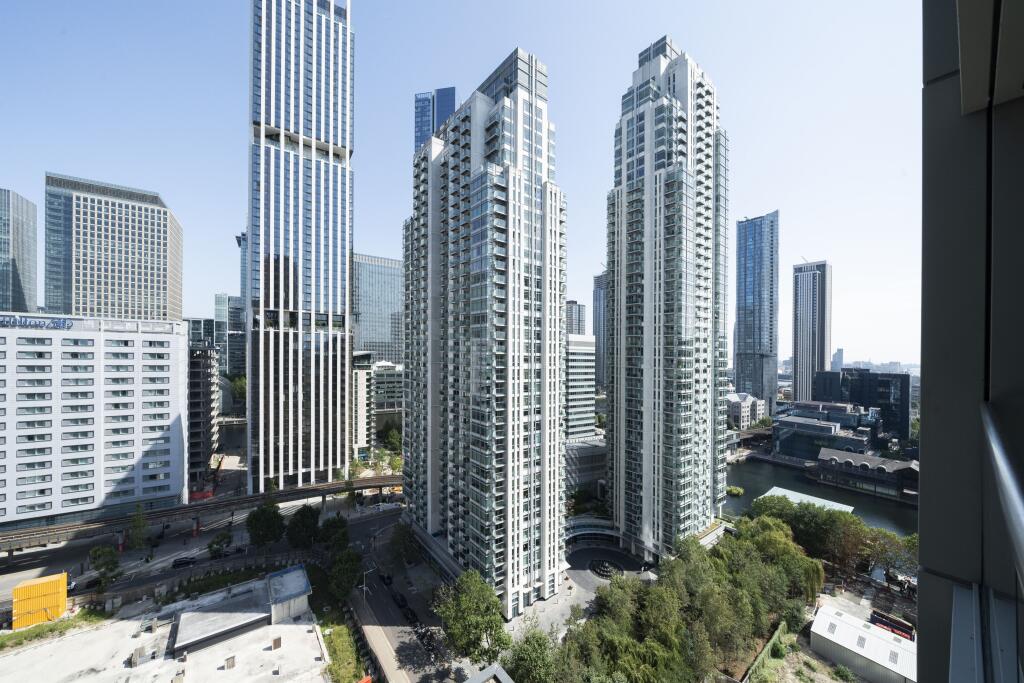 Explore this vibrant urban skyline, where modern architecture meets natural beauty.