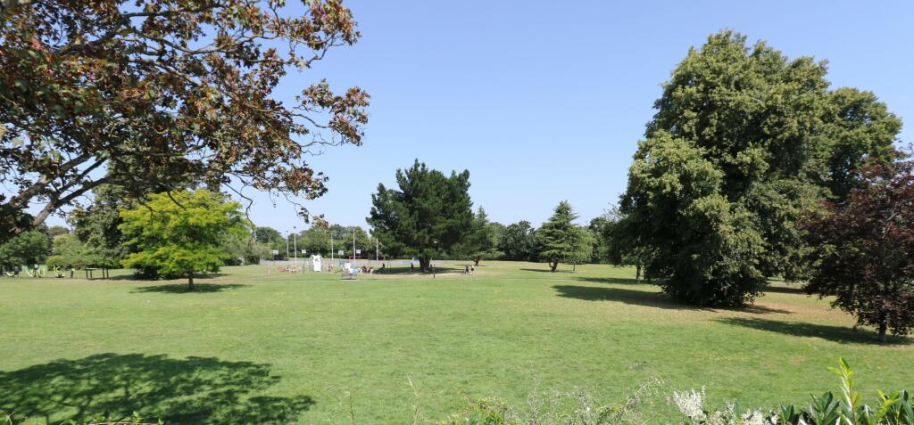 backing onto open park