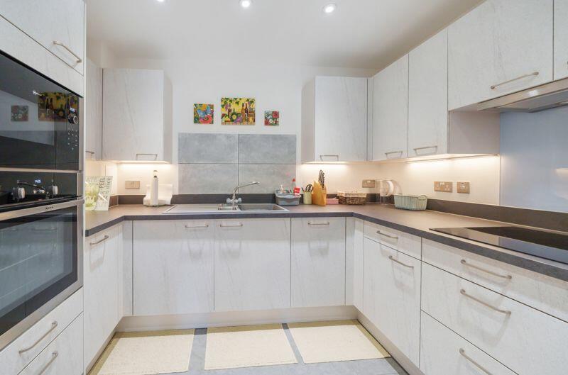 Kitchen with built-in appliances