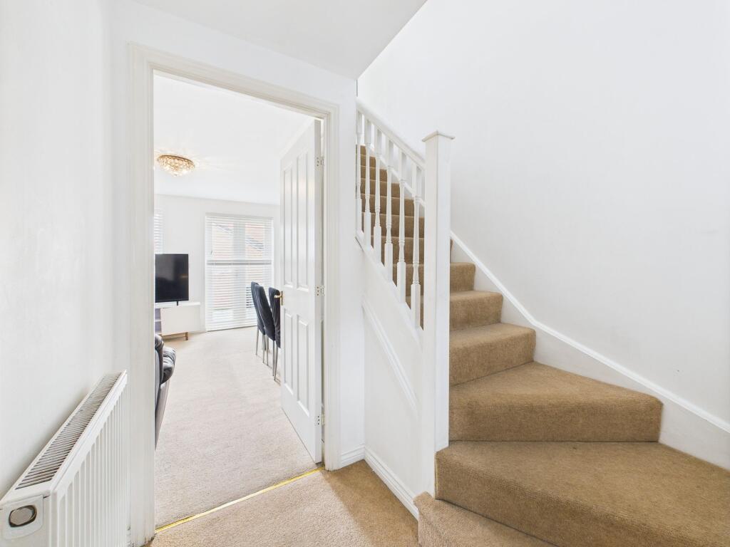 Entrance Hall through to Lounge