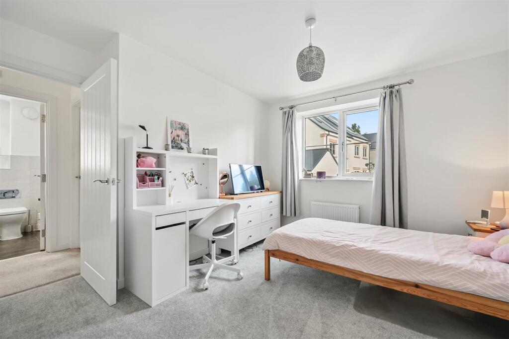 Bedroom Three to window and landing.jpg