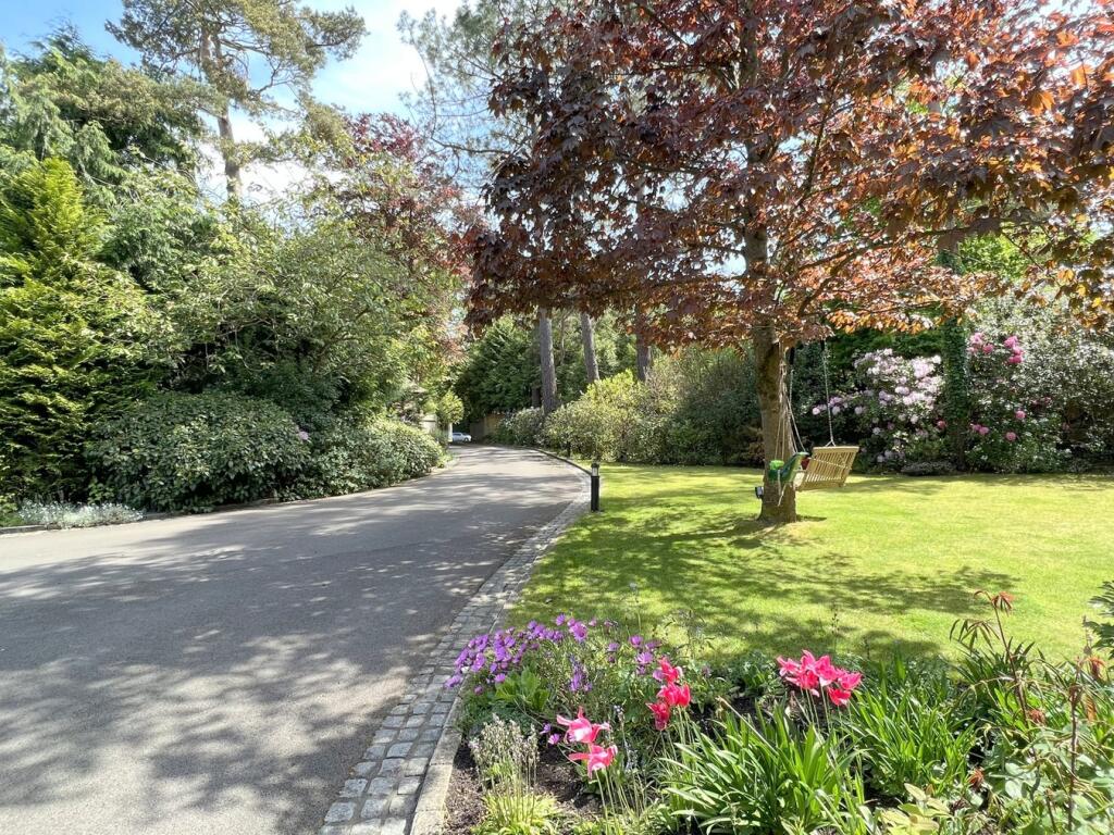 Private driveway and front garden