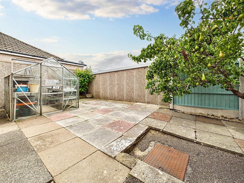 Wrap around Garden with Pear Tree and Green House