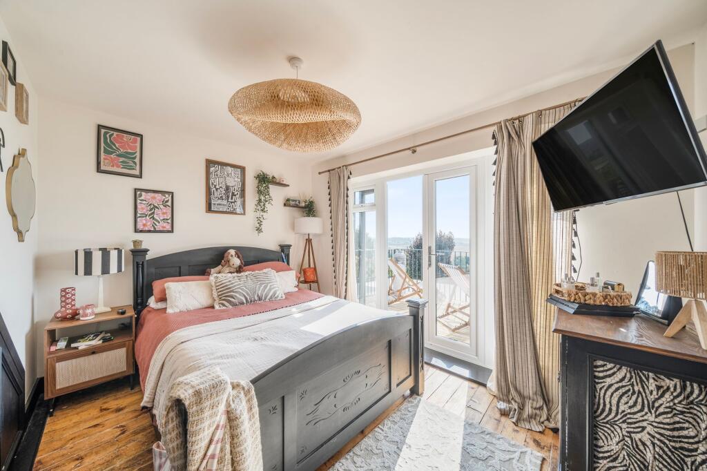 Bedroom Three with Balcony Access