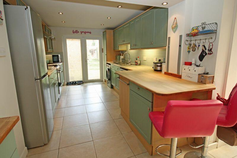 Kitchen with doors to garden