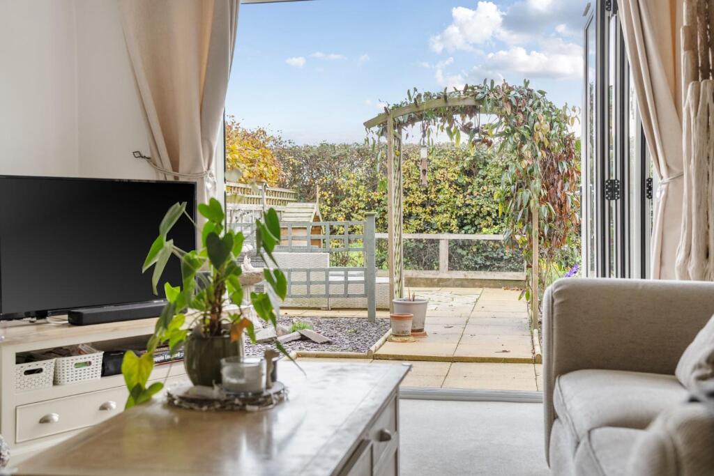 lifestyle lounge through garden.jpg