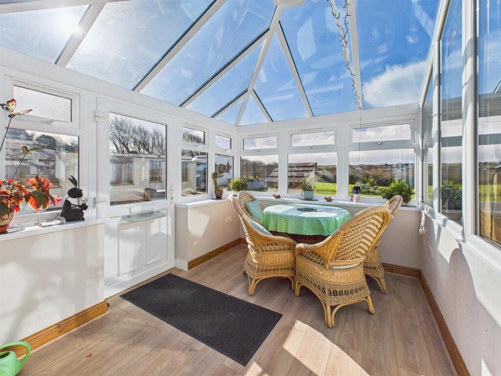 Conservatory Porch Dining.jpg