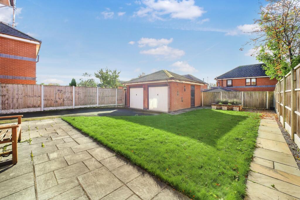 Rear garden with Detached Garage
