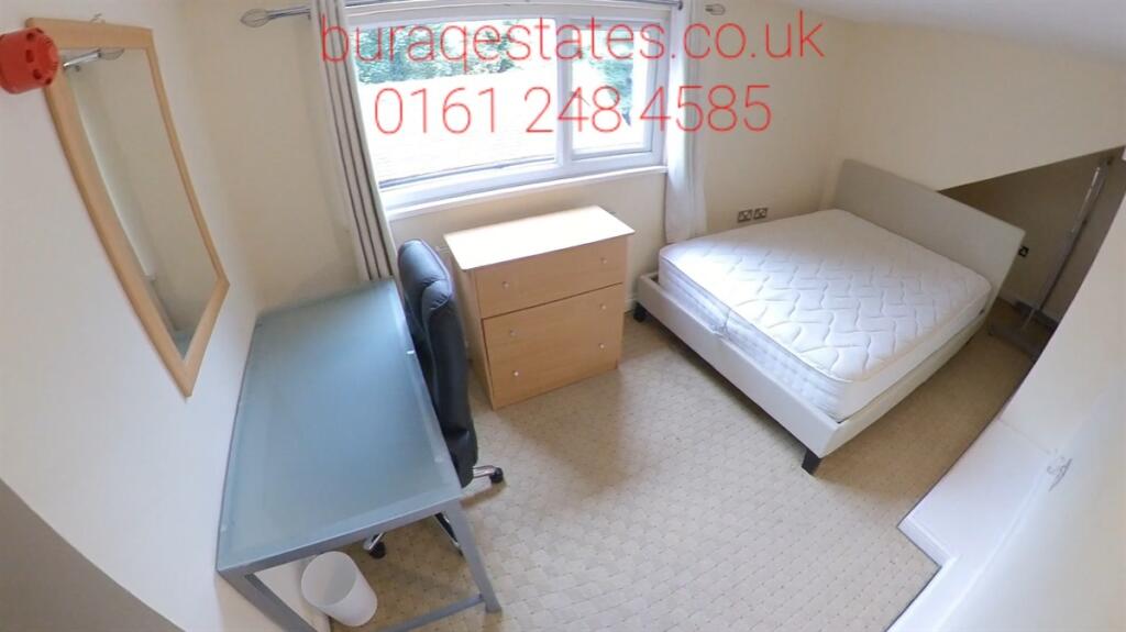 A neat and well-maintained single bedroom featu...