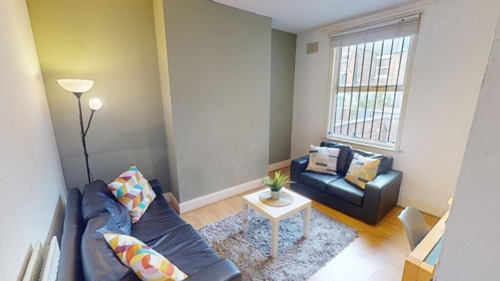 A cozy living room featuring comfortable seatin...