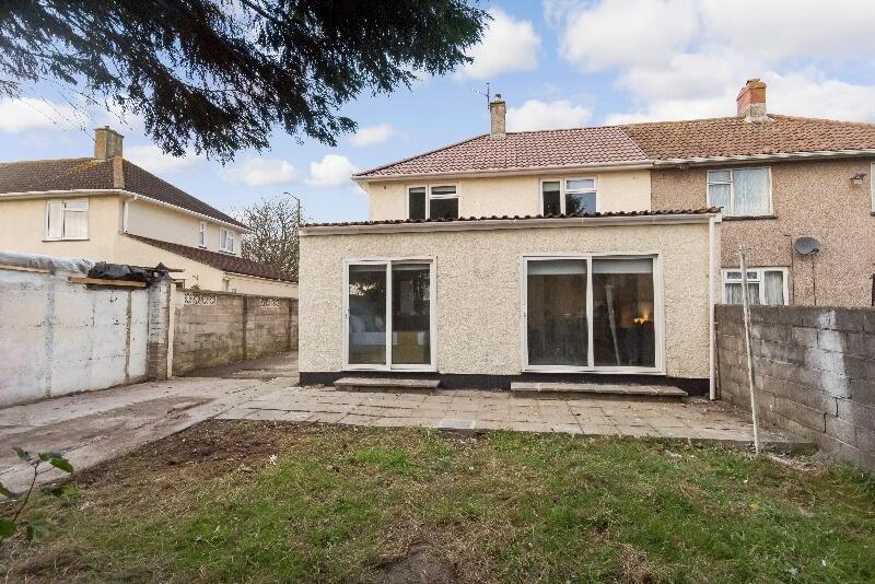 A well-maintained exterior of a semi-detached h...