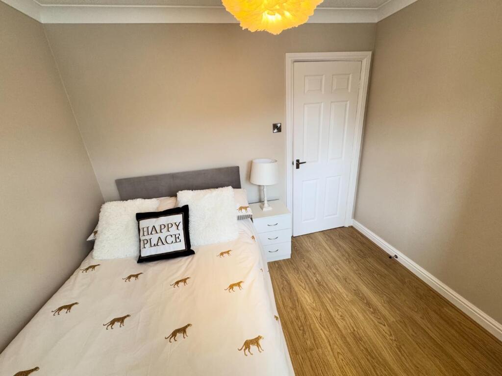 BEDROOM ( REAR)
