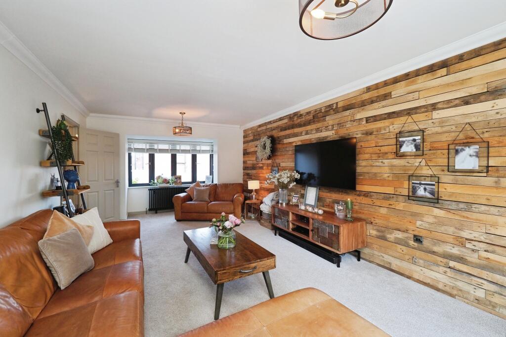 Stunning Lounge with Bay, Bi folds and Feature Wall