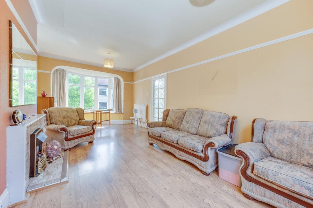 BREAKFAST KITCHEN AND THROUGH SITTING DINING ROOM