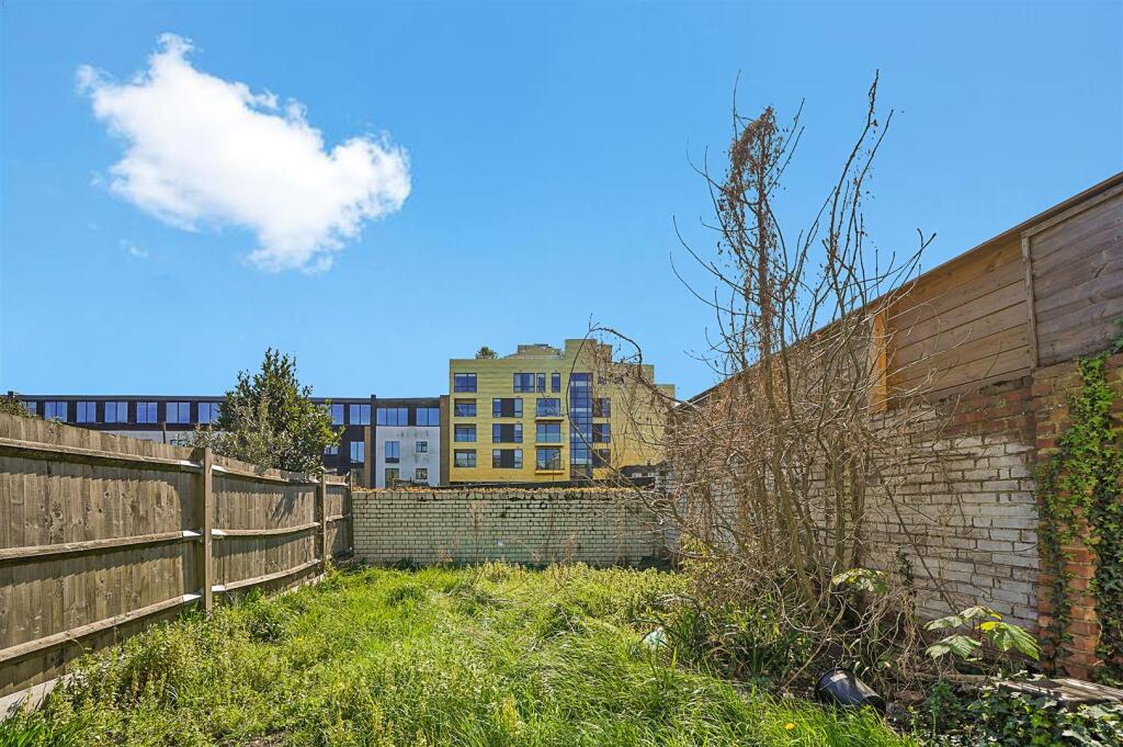 South facing rear garden approximately 50 ft. in l
