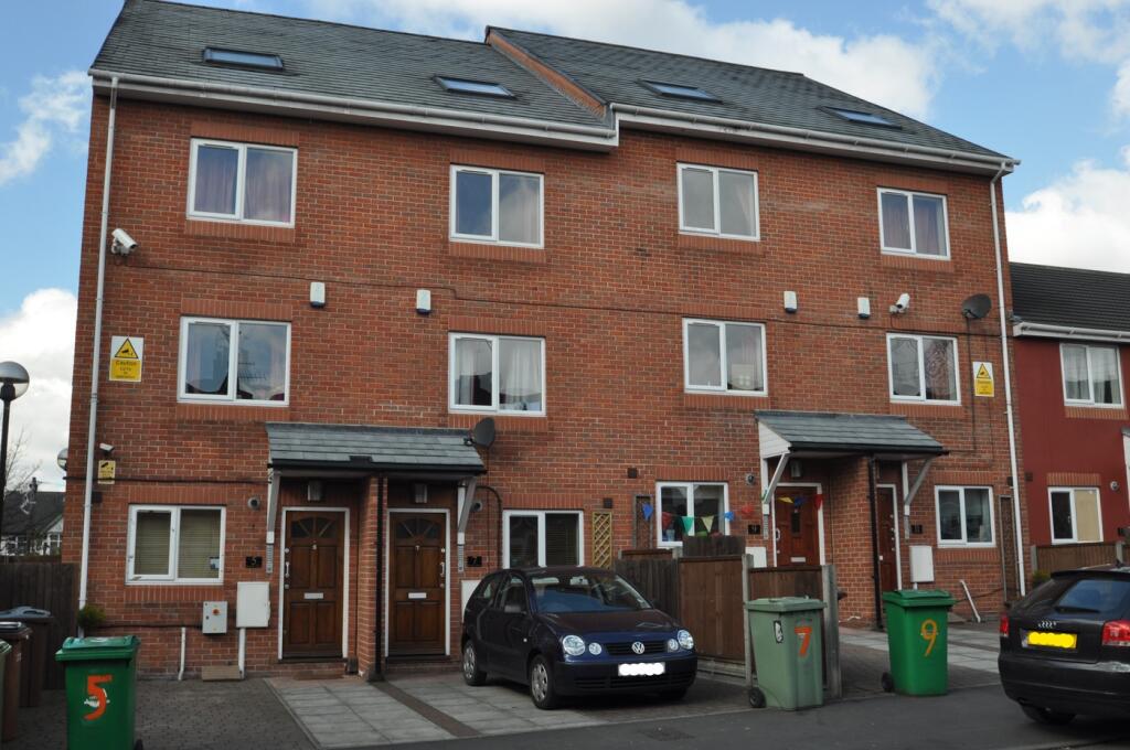 A well-maintained and inviting exterior view of...