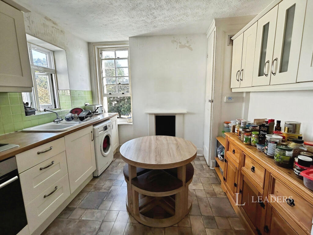 Kitchen (walls will be repaired)