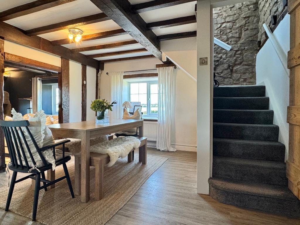 Dining room, stairs to bedrooms