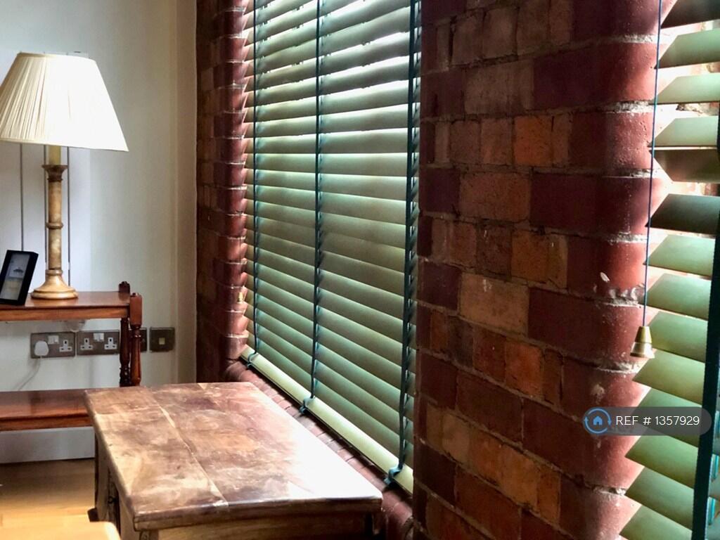 Exposed Red Brick Wall