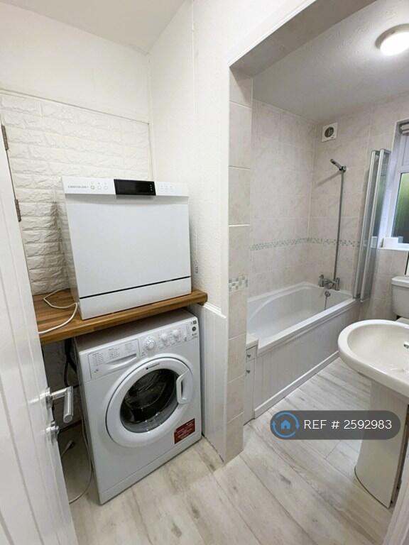 Utility Area, Leading To Bathroom