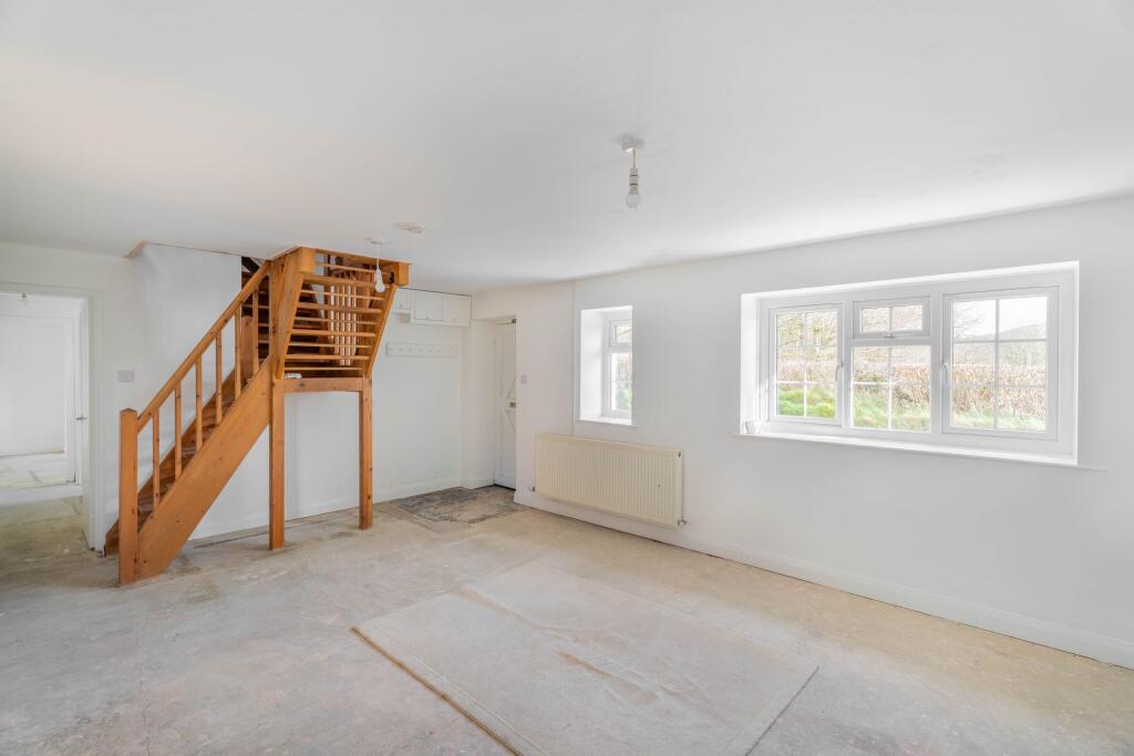 Living Room with stairs to 1st floor