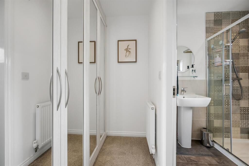 Bedroom Four en-suite and wardrobes.jpg