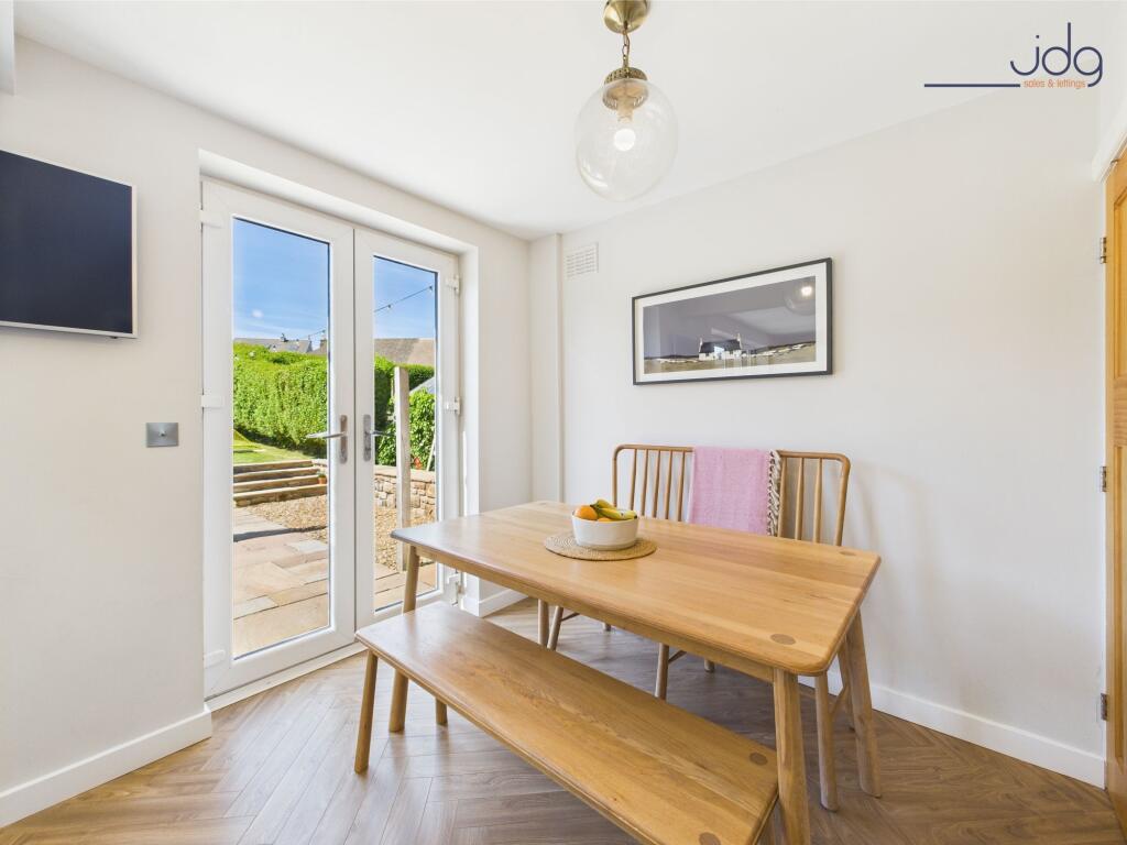 Open Plan Kitchen Diner with twin sets of French doors