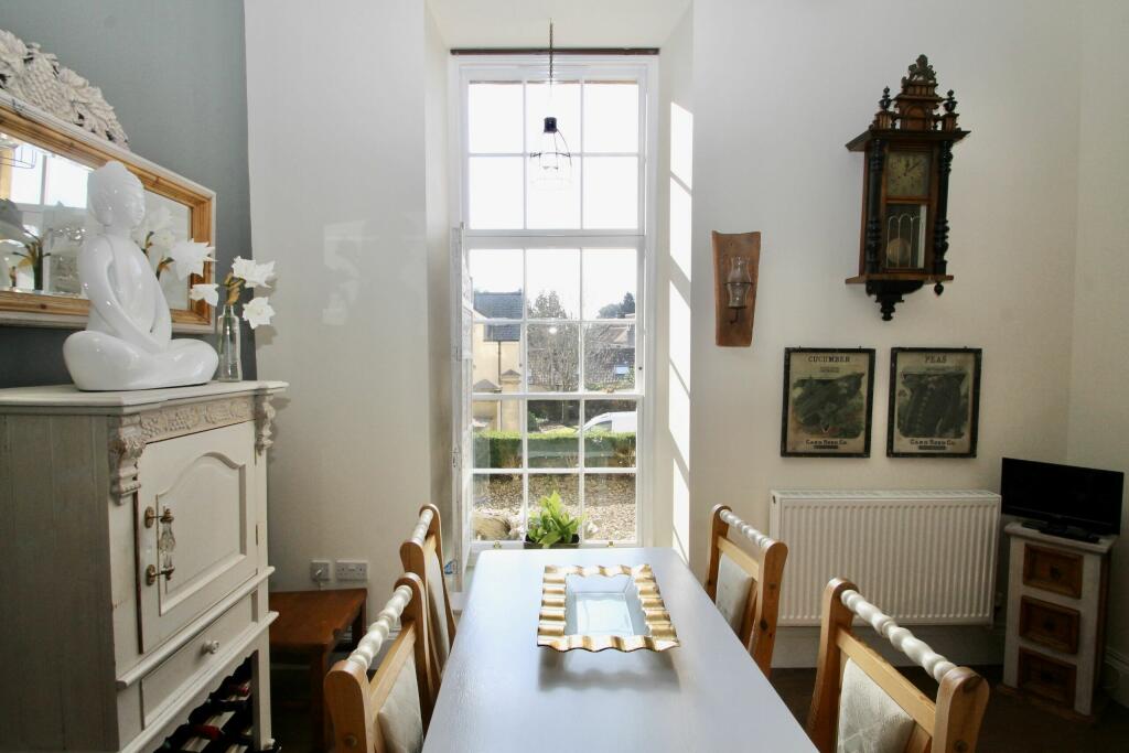 Dining area of kitchen with feature window