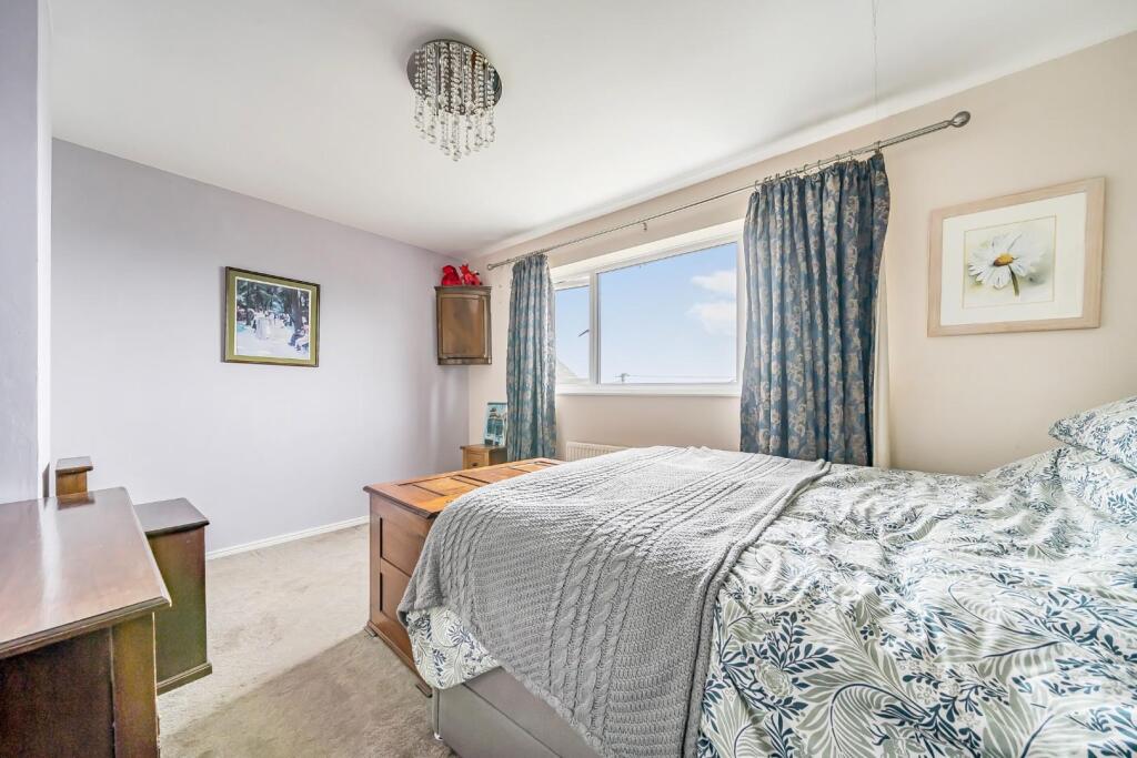 Bedroom 1 with window view.jpg