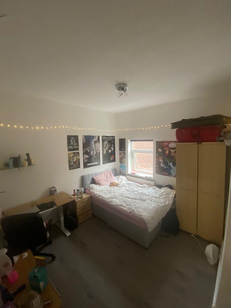 A cozy double bedroom with charming decor, perf...
