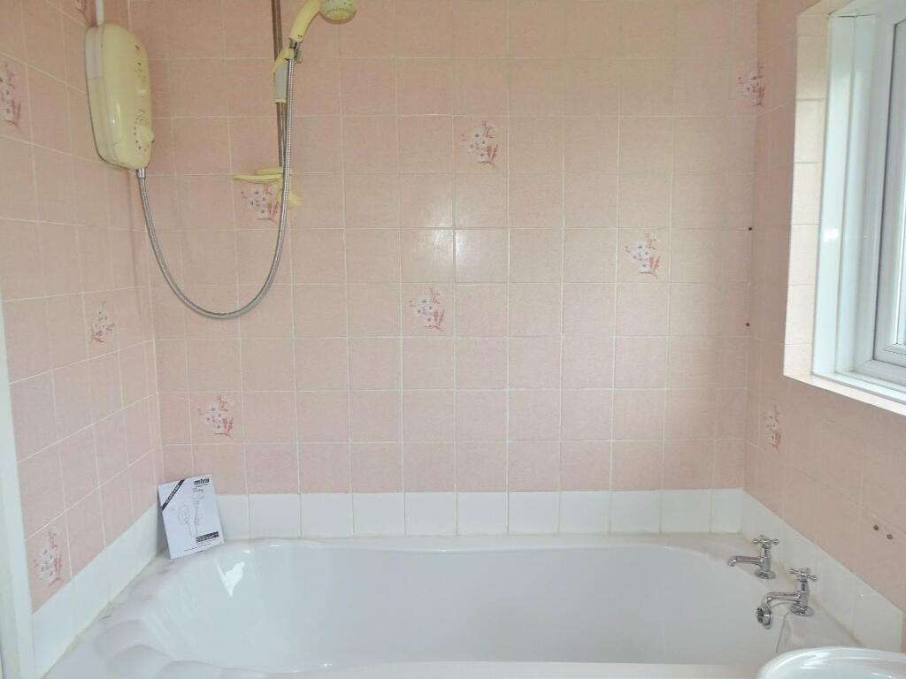 FITTED WITH ELECTRIC SHOWER