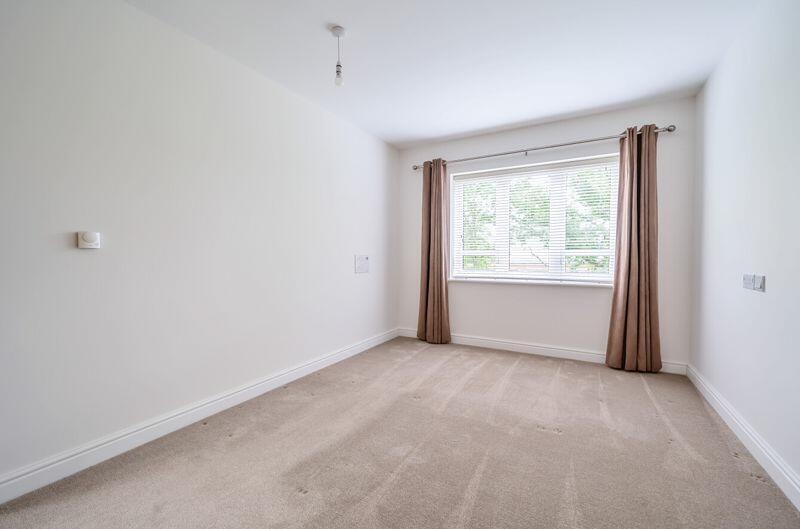 Bedroom with fitted wardrobe and ensuite