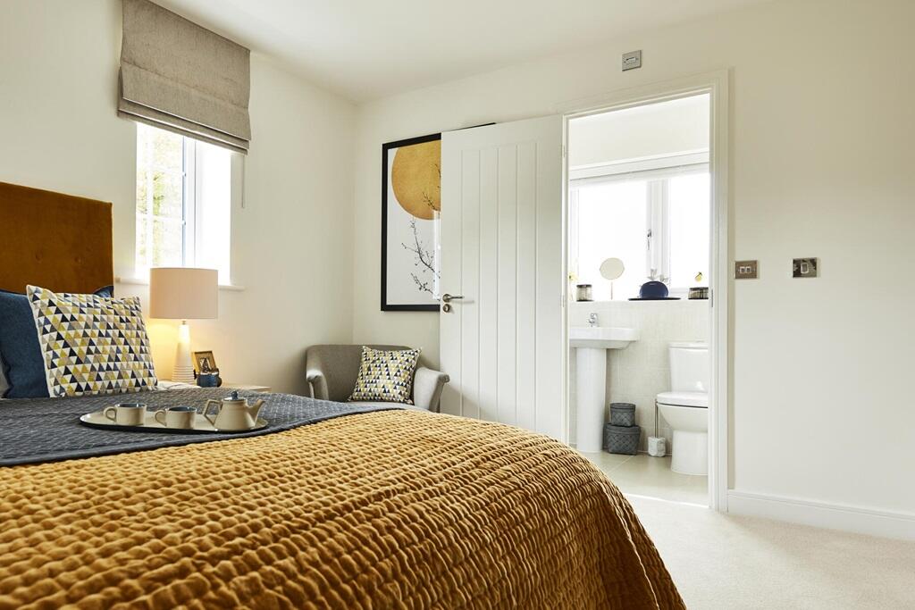 Main bedroom with a private en-suite