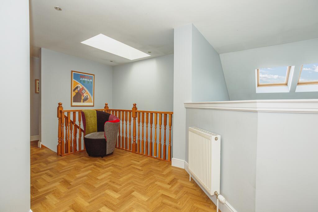 Uppe Landing with Parquet Flooring