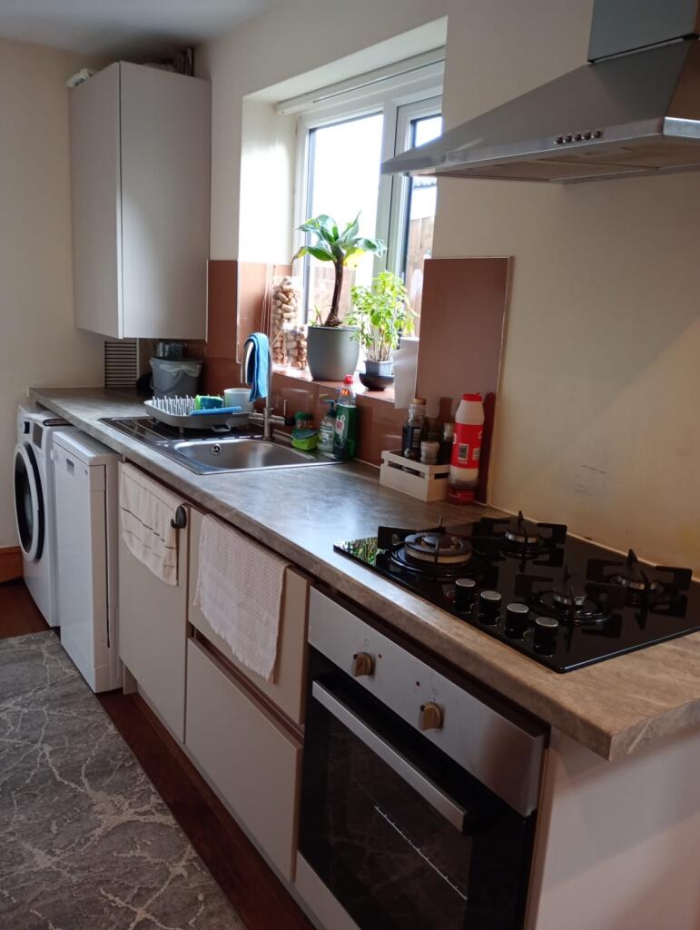 Bright and functional kitchen featuring modern ...