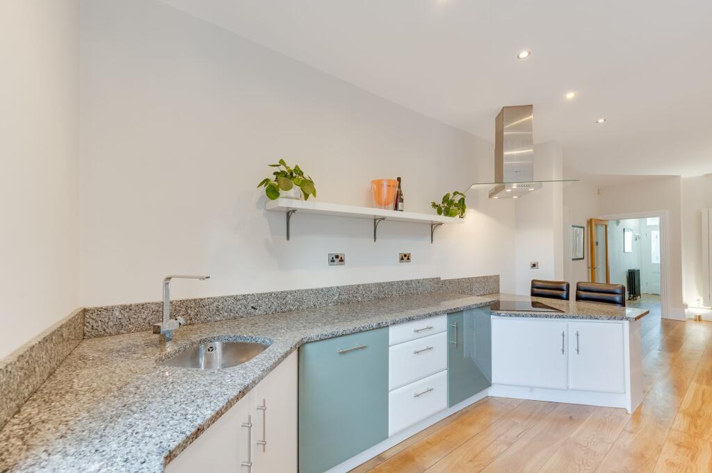 KITCHEN, DINER AND LIVING ROOM