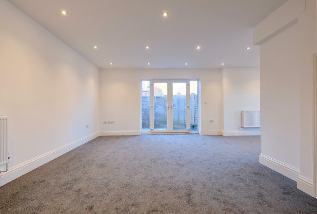 Living/Sitting room with patio doors