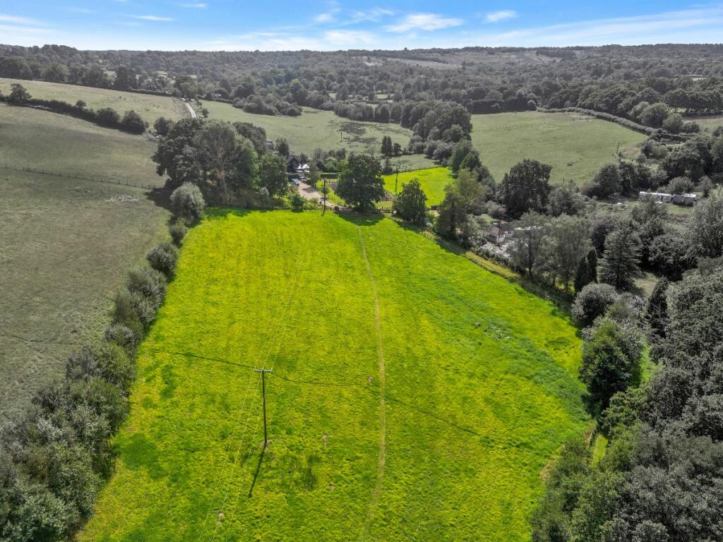Drone view of land with views of Ashdown Forest