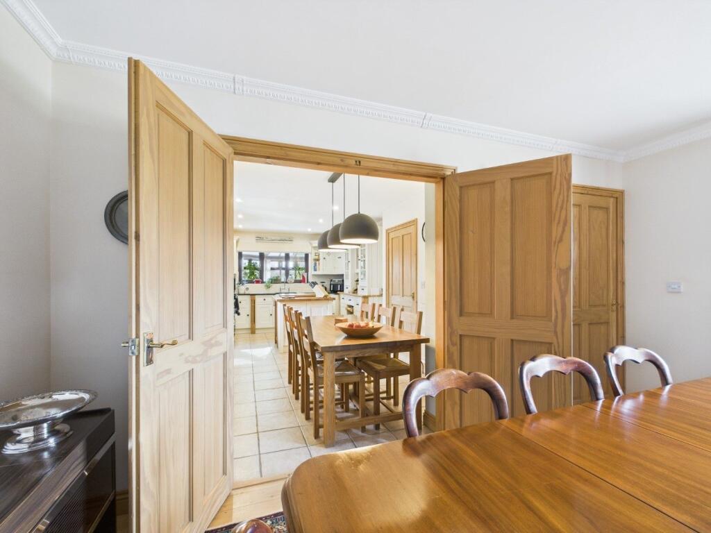 Doors Opening To Kitchen