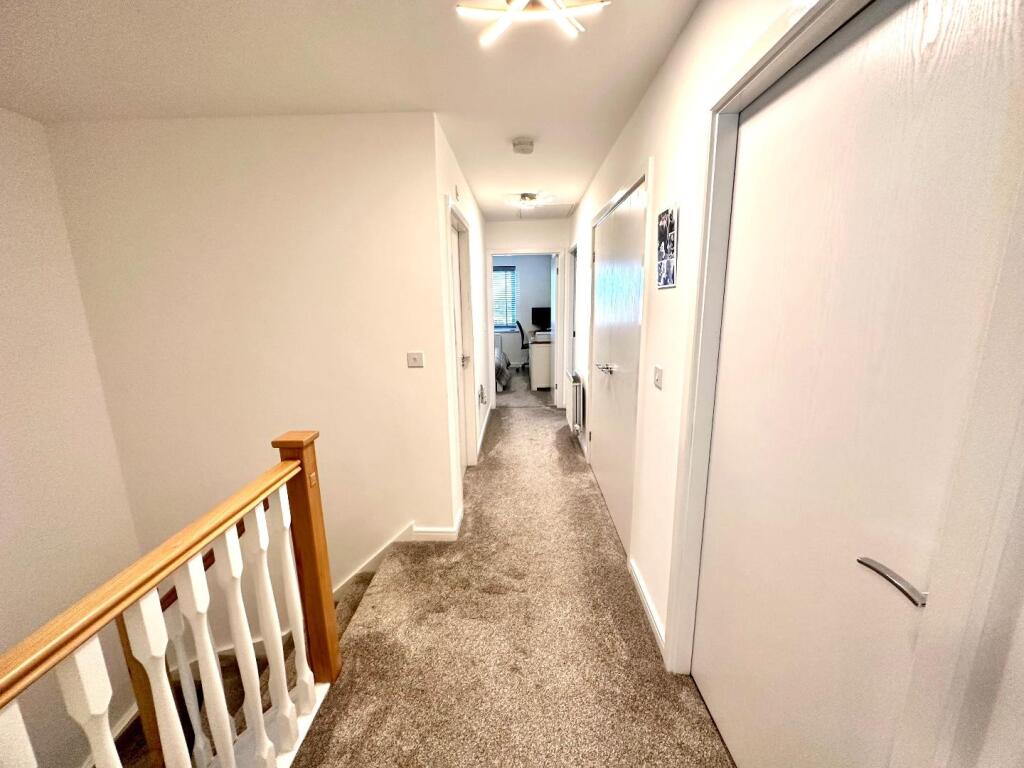 TO THE FIRST FLOOR LANDING