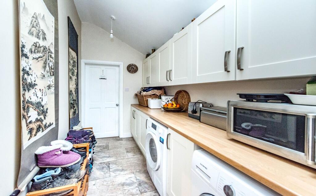 SITTING ROOM DINING KITCHEN AND UTILITY ROOM