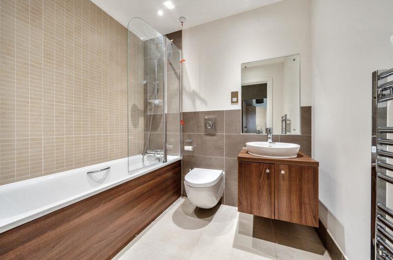 Bathroom with over-bath shower