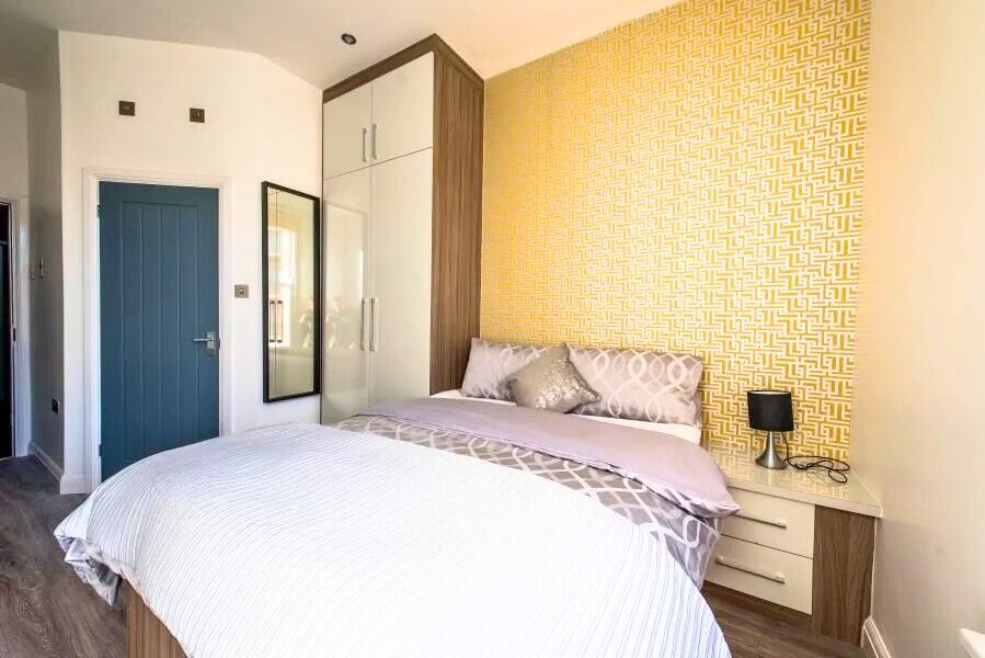 Bright and inviting double bedroom featuring a ...