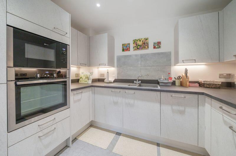 Kitchen with built-in appliances