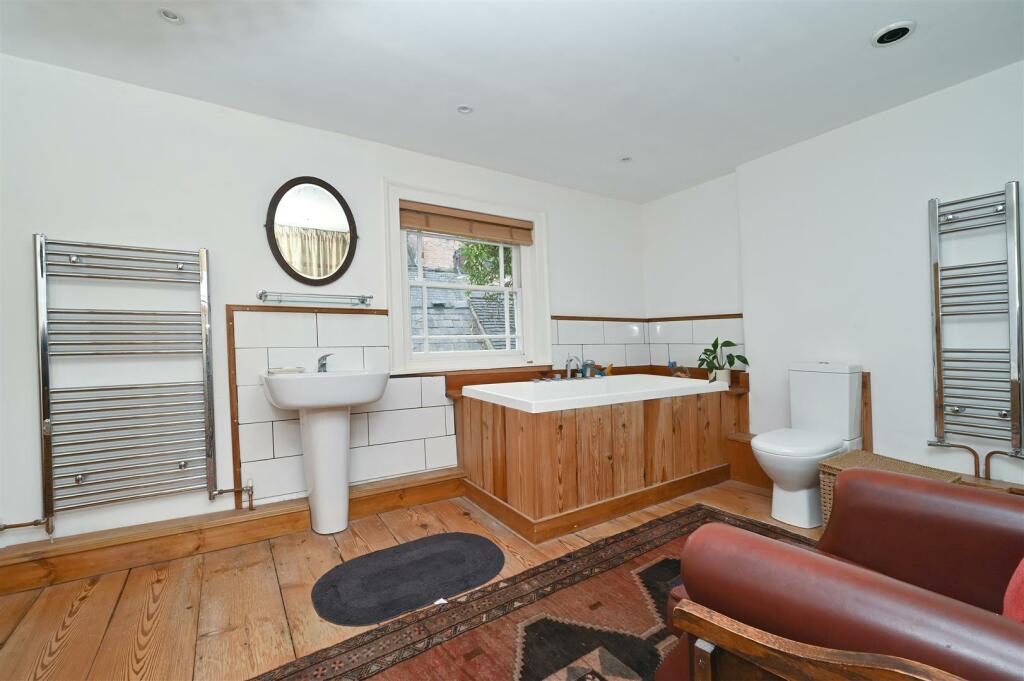 Bathroom - bath, sink and window.jpg