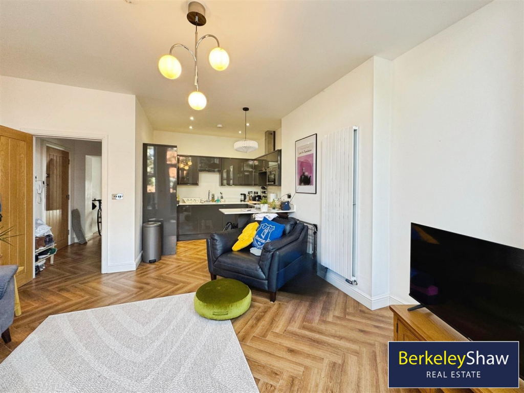 Living area to kitchen